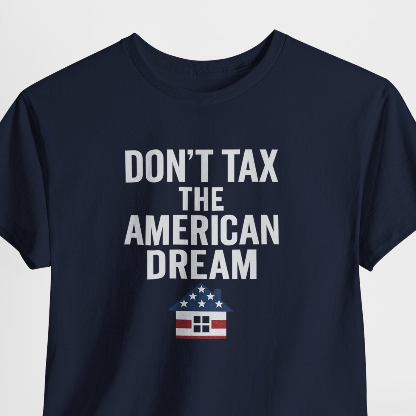 Navy blue t-shirt with 'Don't Tax the American Dream' text on a light gray background